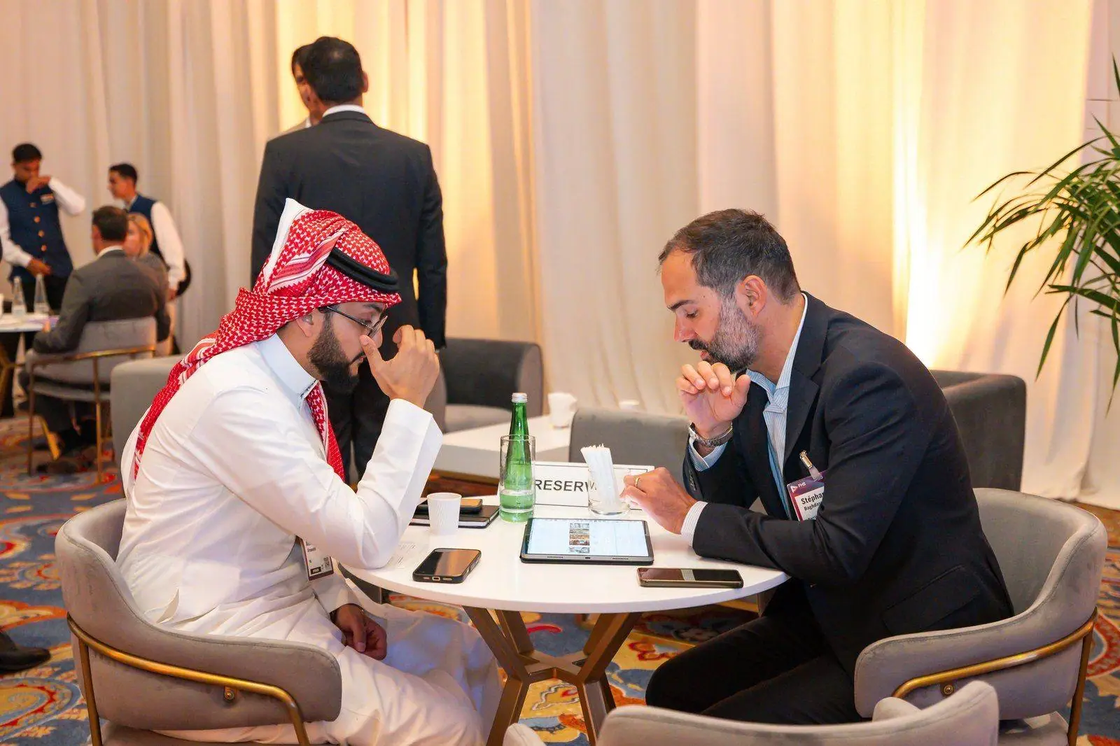 A 1:1 meeting between delegates at a Future Hospitality Summit event